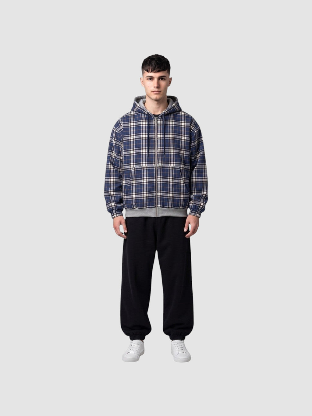 Y2K AVENUE reversible zip-up hoodie featuring a blue, white, and black tartan plaid pattern on a male model.