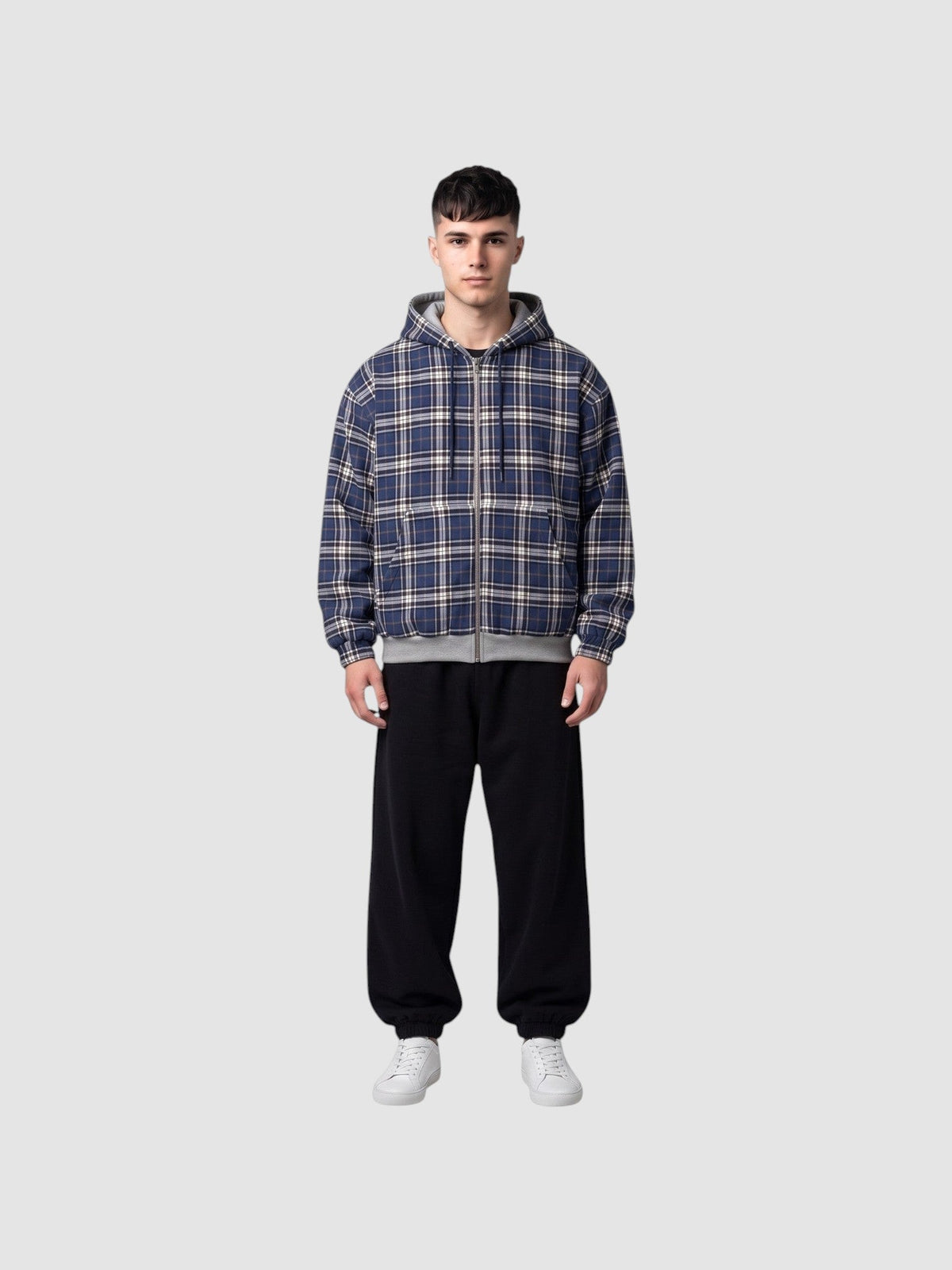 Y2K AVENUE reversible zip-up hoodie featuring a blue, white, and black tartan plaid pattern on a male model.