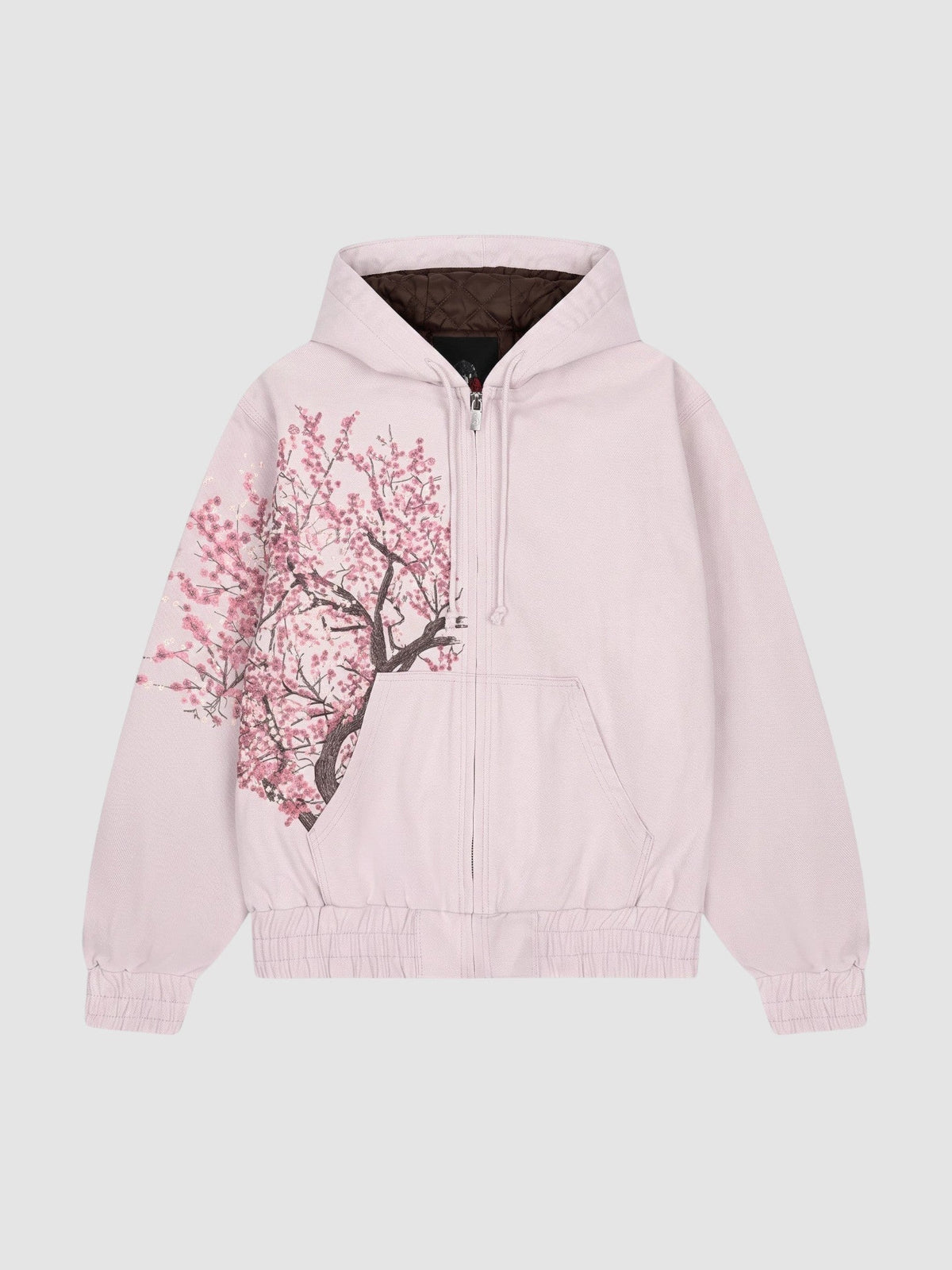 Y2K Avenue Sakura zip-up hoodie in faded powder pink cotton with an asymmetrical cherry blossom print and dark lining.