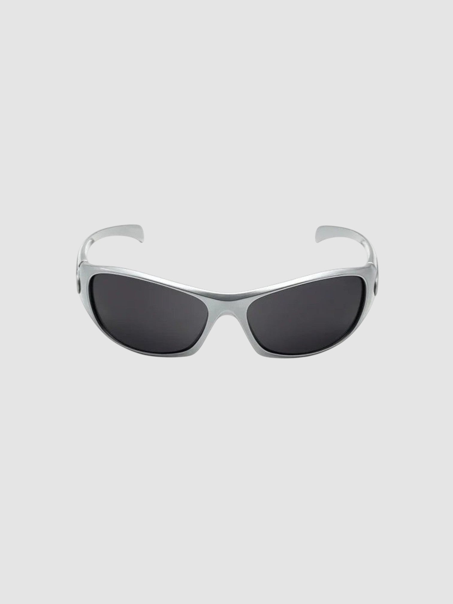 Y2K Avenue silver and black wraparound sport sunglasses with UV400 polycarbonate lenses for an active Y2K aesthetic.