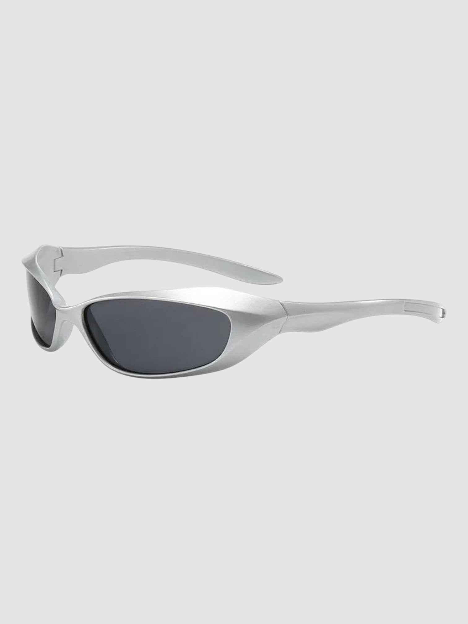 Y2K Avenue futuristic silver wraparound sunglasses with dark tinted lenses and a metallic polycarbonate frame.