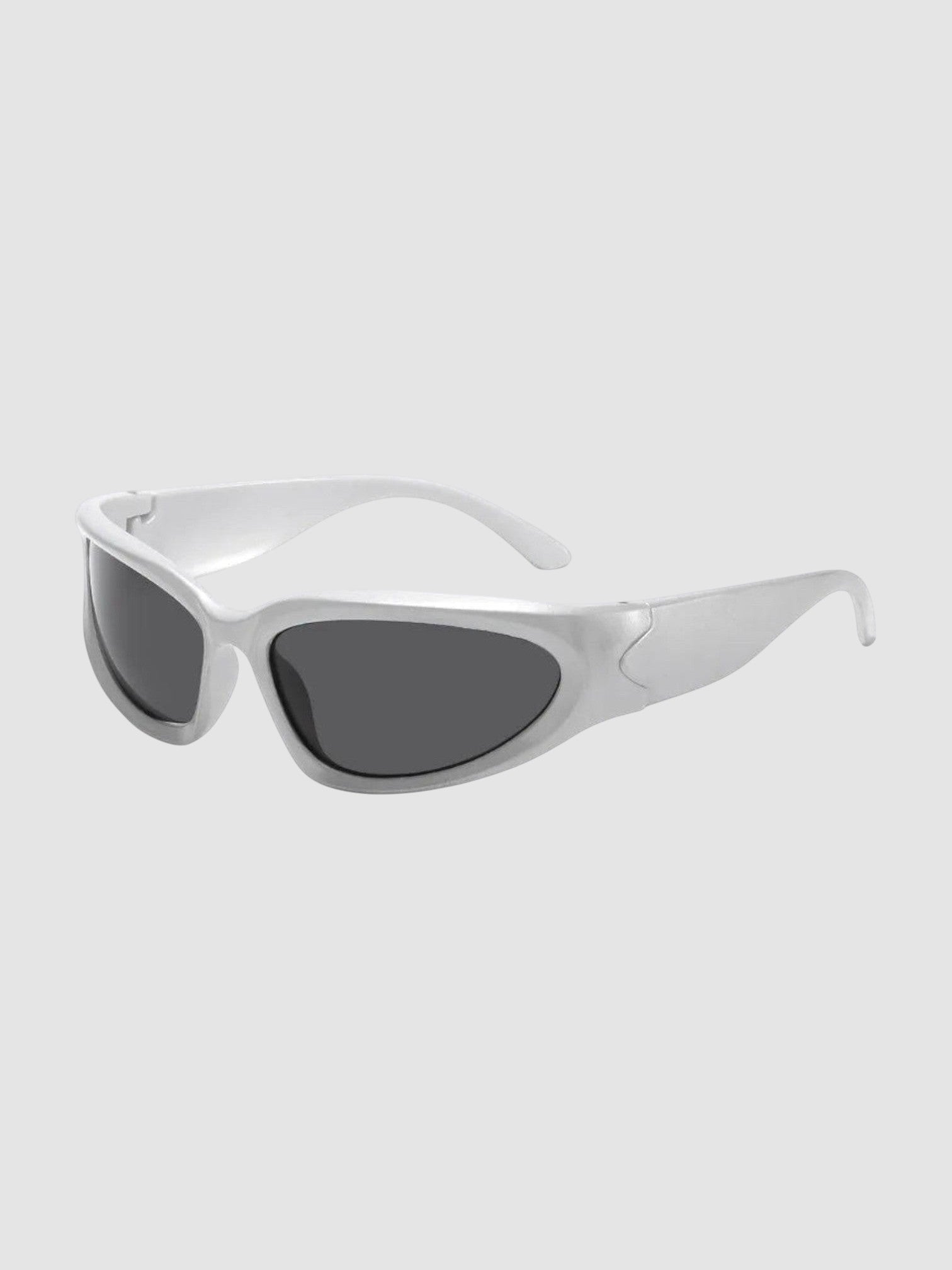 Y2K Avenue gorpcore wraparound sunglasses in silver with dark grey tinted lenses and a technical frame design.