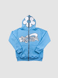Y2K Avenue sky blue zip-up hoodie featuring a large white flower on the hood and bubble lettering graphic on front.