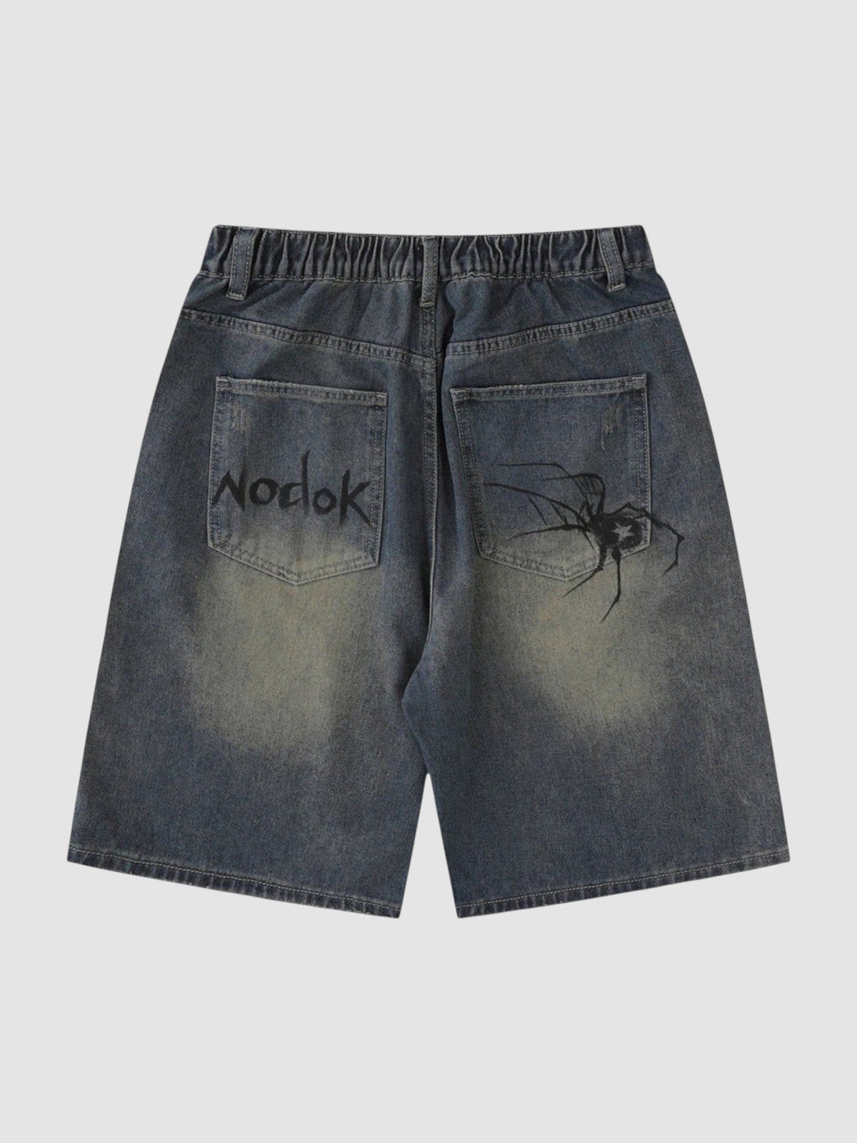Y2K Avenue blue denim jorts with spider graphic on the back pocket and graffiti style text on the other pocket