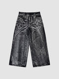 Y2K Avenue wide-leg denim jeans in acid wash black and grey with raw-edge spiderweb fabric appliqués.