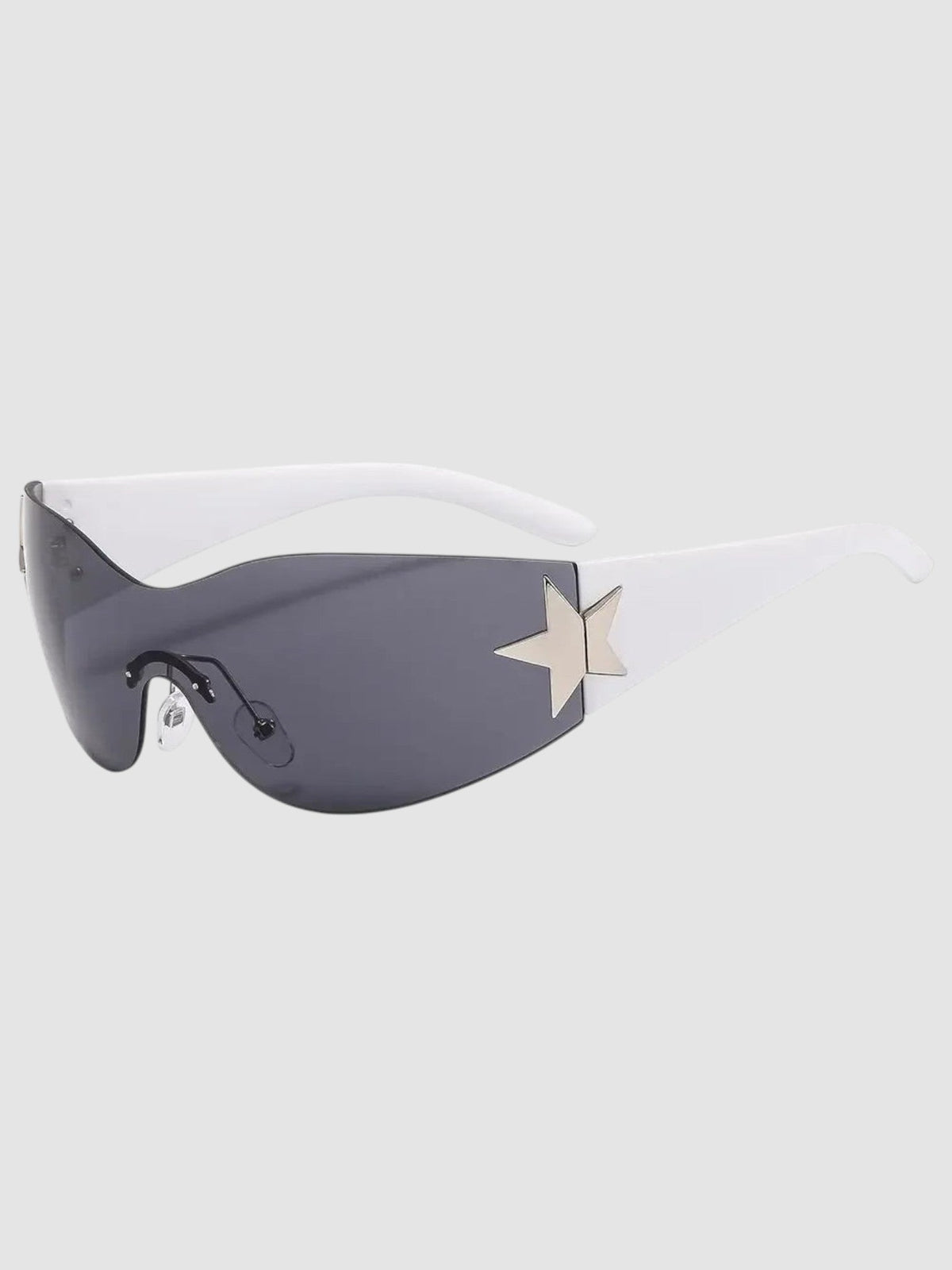 Y2K Avenue star-embellished wraparound shield sunglasses with dark grey lenses and white temples in a Y2K style.