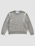 Y2K Avenue taupe grey cotton knit sweater with a gothic dollar sign applique and white-tipped ribbed hem and cuffs.