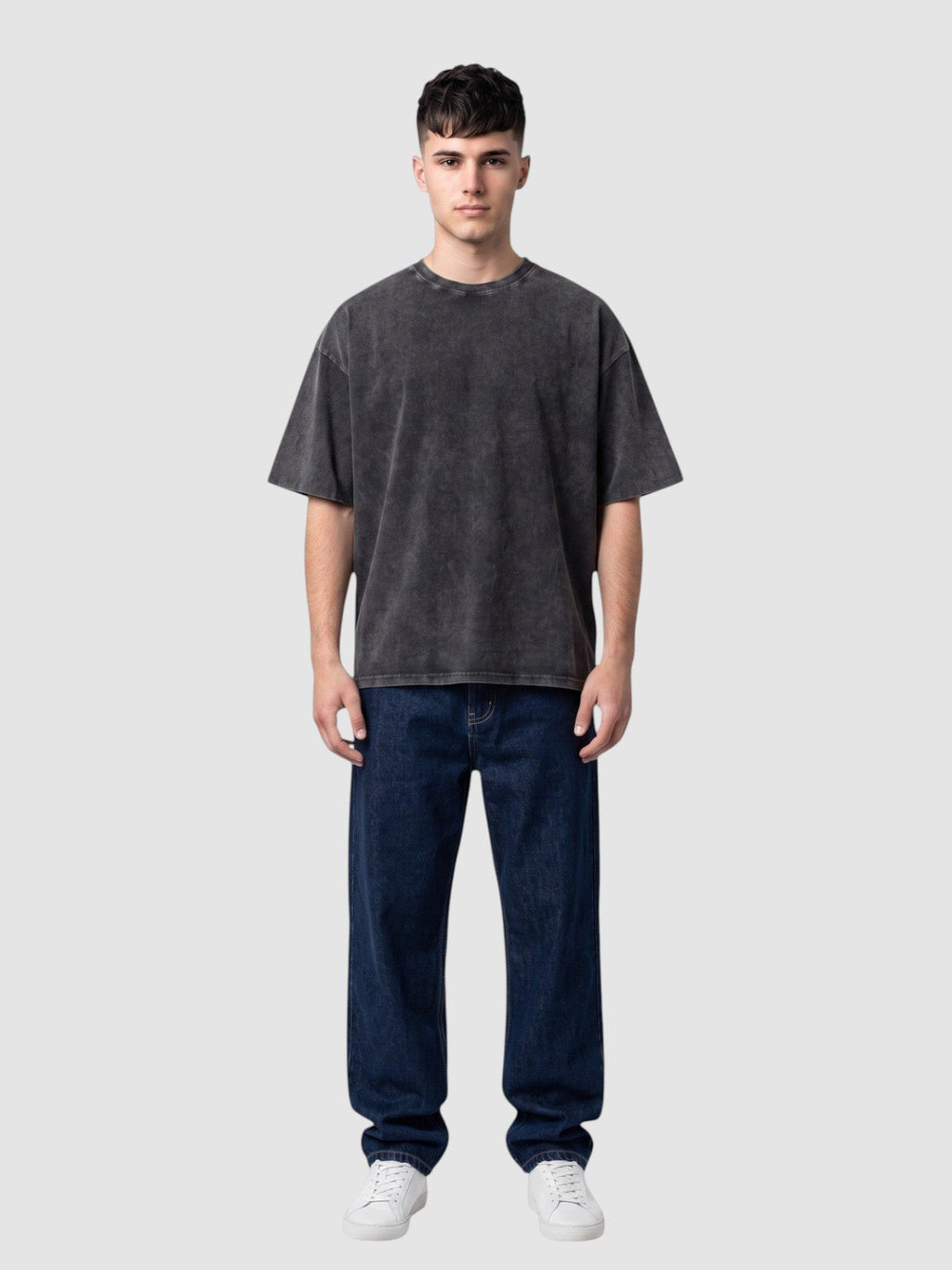 Y2K Avenue vintage washed black cotton t-shirt with a relaxed fit, crew neck, and short sleeves on a male model.