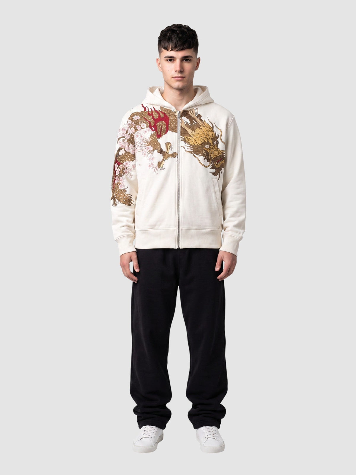 Y2K Avenue white zip-up hoodie featuring a gold and red dragon and cherry blossom print, worn by a male model.