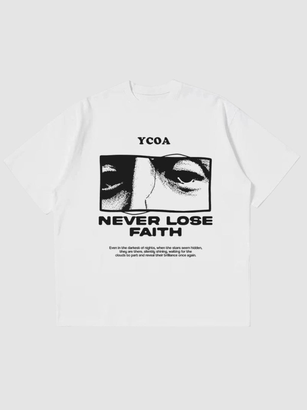 Y2K Avenue white oversize t-shirt with Never Lose Faith graphic print featuring eyes and bold typography
