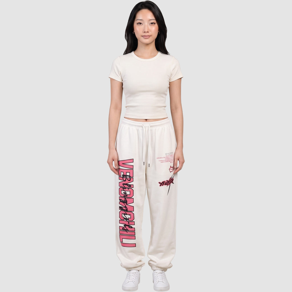 Y2K AVENUE white cotton blend joggers with pink vertical lettering and graphic prints worn by a model