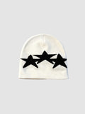 Y2K Avenue white acrylic beanie featuring three overlapping black star motifs in a graphic Y2K style