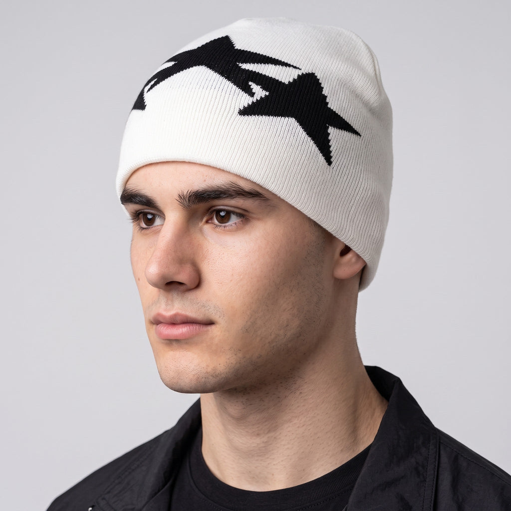 Y2K AVENUE white knit beanie with black geometric star pattern worn by a man for a casual winter look